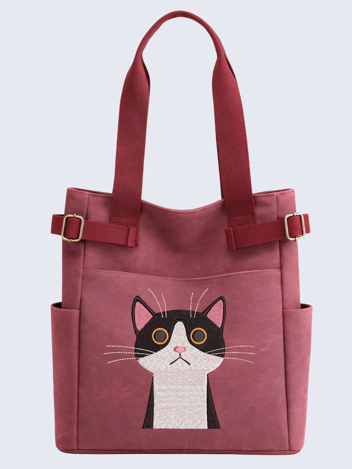 Embroidery Purple Bag 02 Cute Funny Annoyed Cat Embroidered tuxedo cat tote bag in burgundy with side pockets. Quirky cat-themed canvas handbag with adjustable straps for cat lovers.