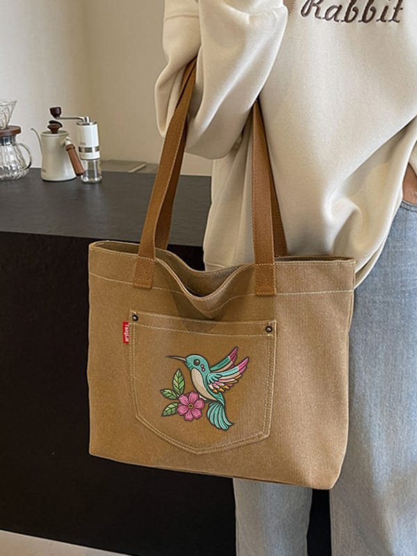 Carry a Piece of Embroidered Art Shop Our Hembroidered Tote Mobile