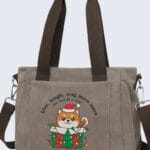 Boutique embroidered festive dog tote bag with a Shiba Inu puppy and holiday lights. Minimalist kawaii aesthetic for dog moms, featuring a funny play on the Live Laugh Love motto.