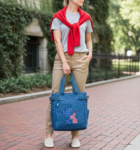 A collage showing four different preppy sweater options in red, white, and navy blue patterns, including stripes and fair isle prints, titled Preppy-Friendly Americana Refresh.
